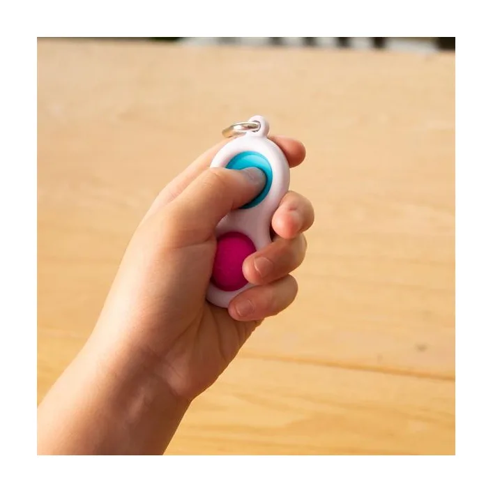 Брелок-антистресс Fat Brain Toys Simpl Dimpl Кнопки 4 цвета в ассорт. (F2111ML)