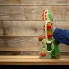 Музыкальная игрушка "Гитара" на батарейках