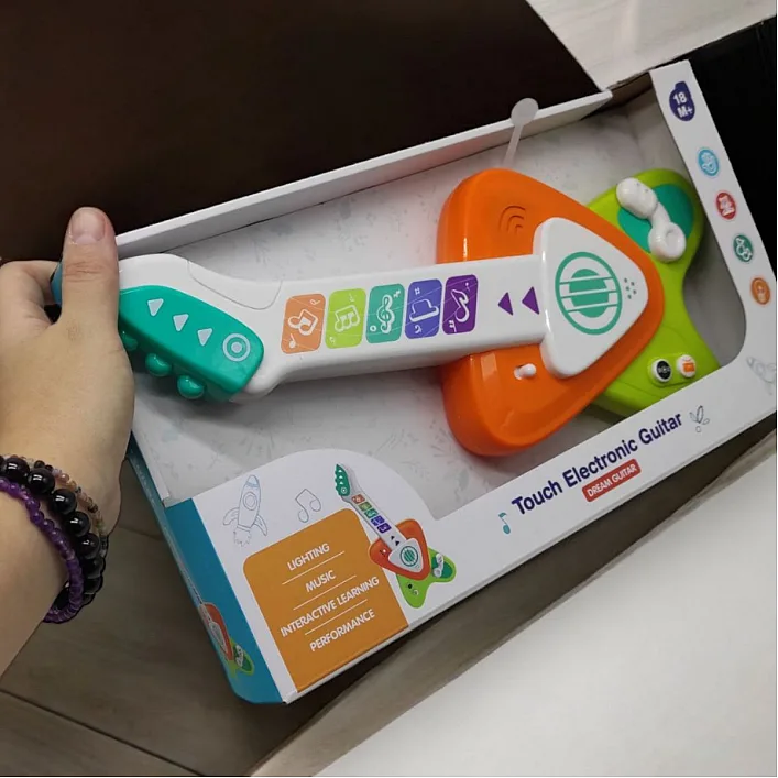 Интерактивная игрушка "Гитара" на батарейках