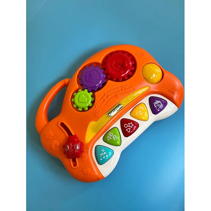 Детская музыкальная игрушка "Забава" 8645(Orange) оранжевый