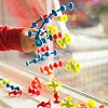 Конструктор Fat Brain Toys Mini Squigz на мини-присосках 75 деталей (F107ML)
