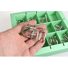 Набор головоломок Metall Puzzles green Eureka 3D Puzzle 473357, 10 головоломок