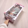 Лялька в коробці